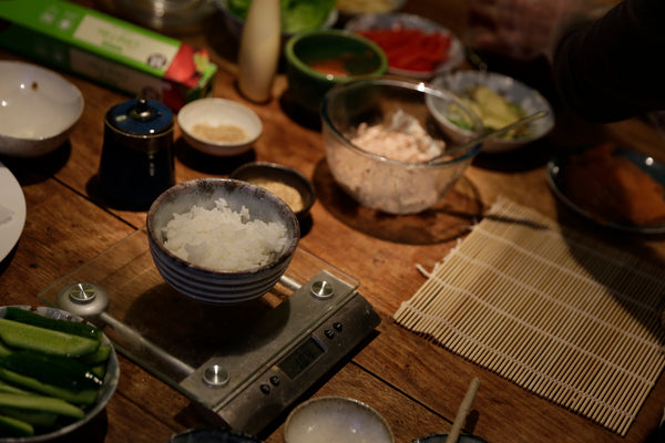 measuring rice for sushi