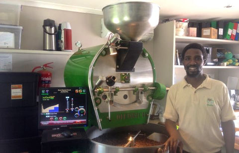 Mzukisi in front of the roaster