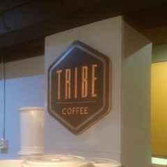 Tribe Coffee Sign On Wall