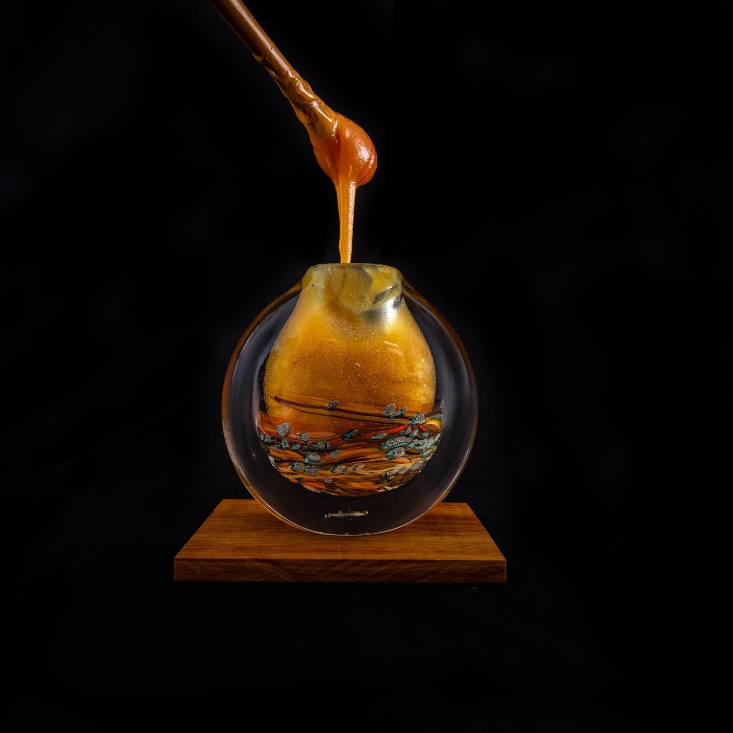 Handblown honey glass jar by Lynden Over Lava Glass