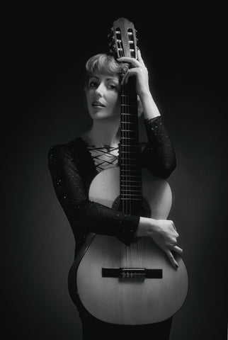 woman with a classical guitar