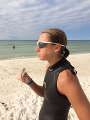 Kate Wheeler eats a brüks bar while training for her 5th Ironman.