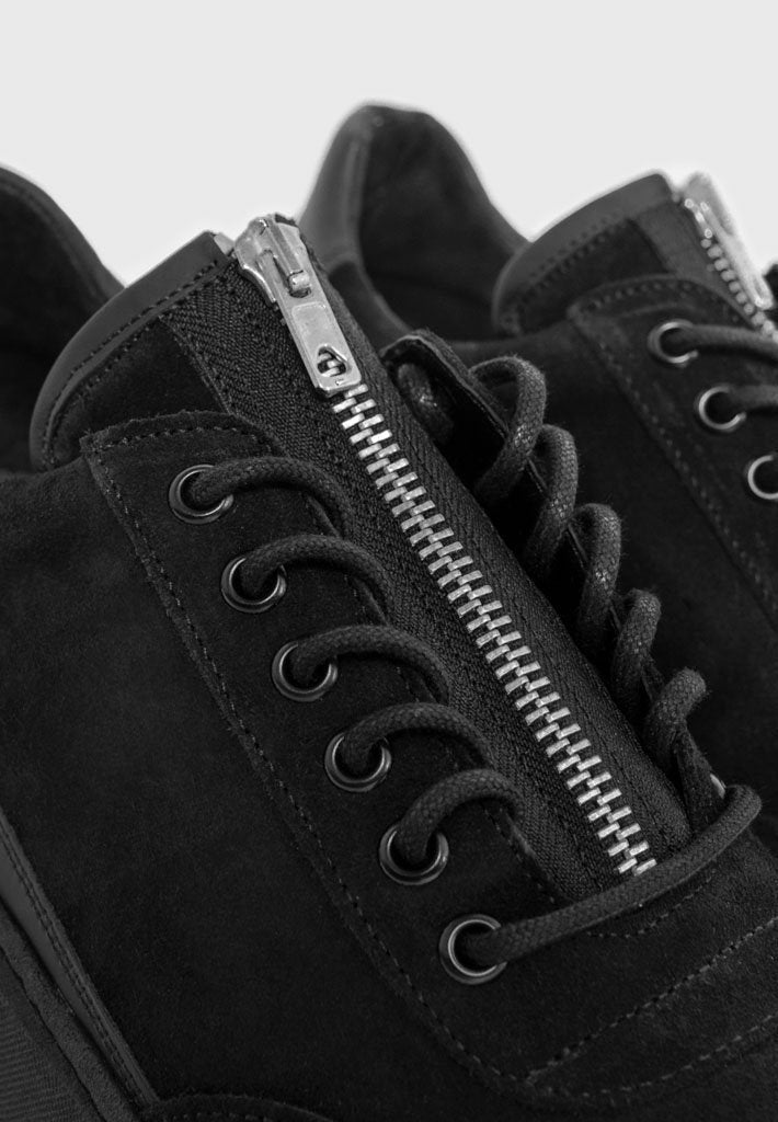 black zip trainers