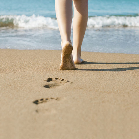 footprint in sand on beach