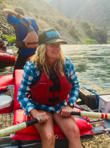 Jen Perry, president and CEO of Jelt on a raft on the Grand Canyon
