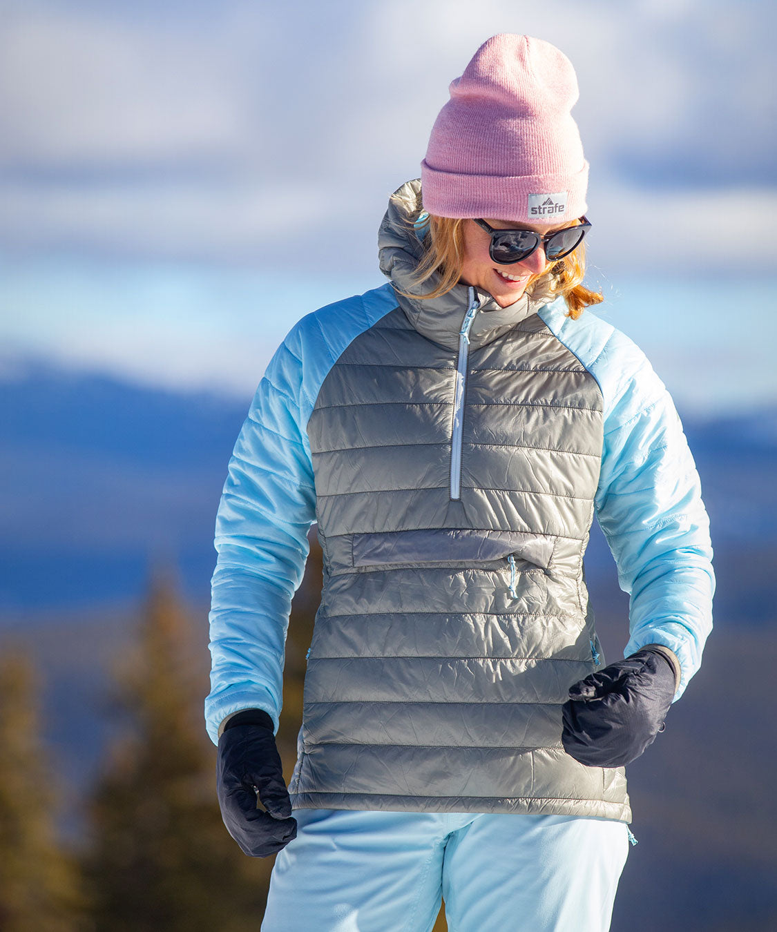 another look at woman in aero pullover standing in snow