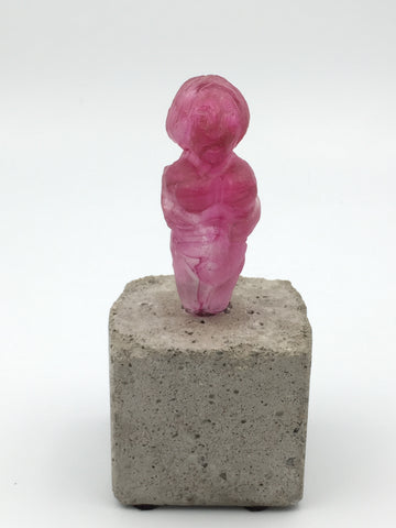 pink glass sculpture by c. anderson