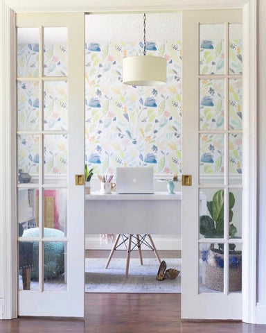 Pastel patterned wallpaper adds pleasant and inviting backdrop