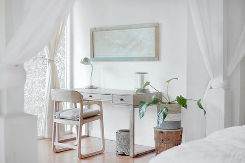 An elegant minimalist workspace design for a guest bedroom
