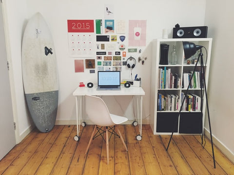 A surfboard accent piece for home office space