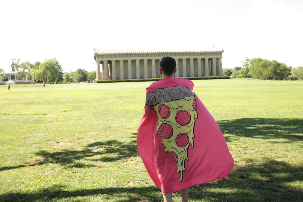 Pizza Party Tapestry in  the park sold by @wallsneedlove.