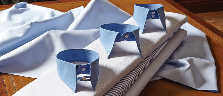 A selection of collars resting on fabric
