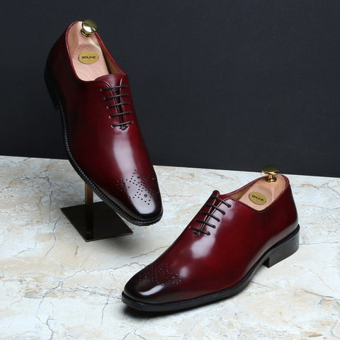 WINE BURNISHED LEATHER MEDALLION TOE WHOLE CUTONE PIECE OXFORD SHOES BY BRUNE
