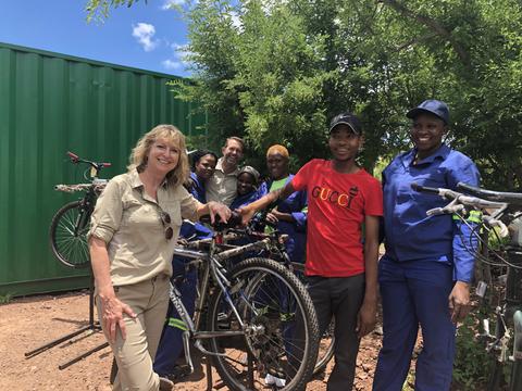 DEBBE OWNER OF BICYCLE WAREHOUSE IN TANZANIA WITH LOCAL CYCLISTS