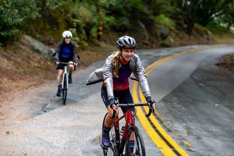 ROAD CYCLISTS RIDING IN THE MOUNTAINS