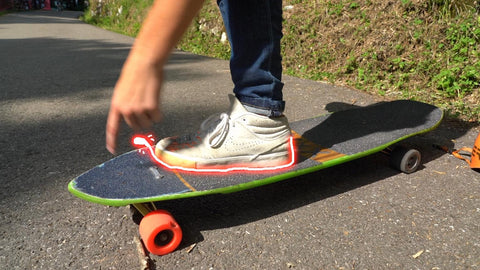 Toeside stand up slide foot position