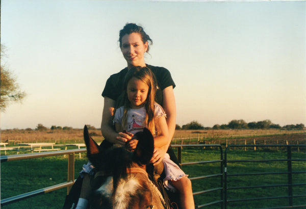 Shiloh Richter and niece horseback at the ranch in Texas