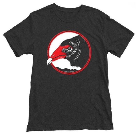 Tee shirt in charcoal gray with a red and white graphic of a turkey vulture head, in a circle.