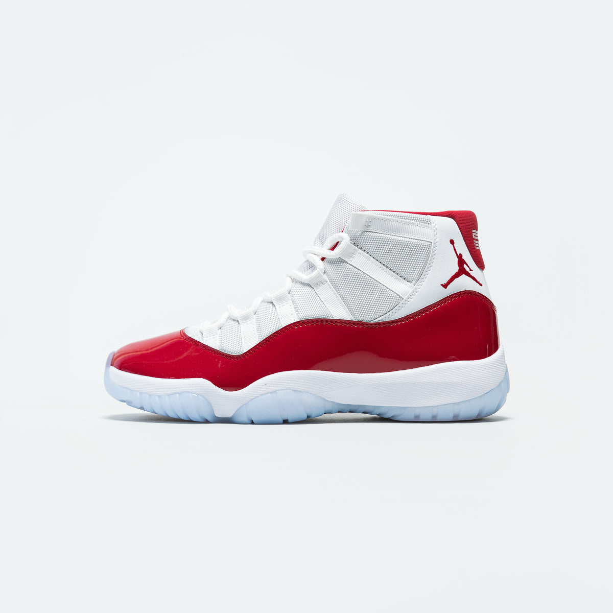 grey and red jordan 11