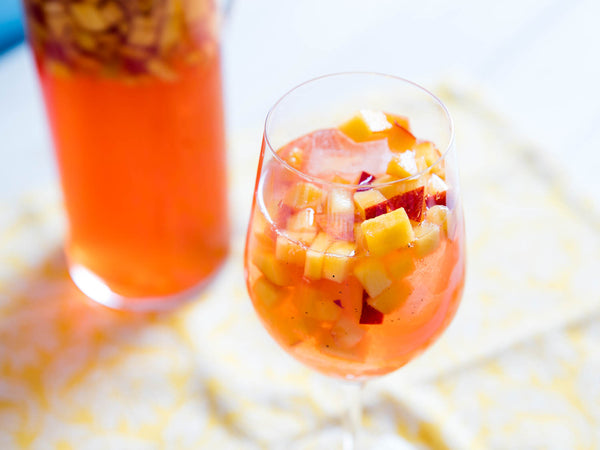 Sparkling Rose Sangria with Aperol and Peaches