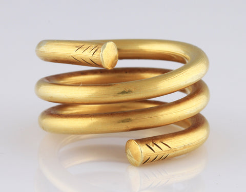 Lot 433 - An ancient Greek gold hair spiral ring, circa 7th Century BC