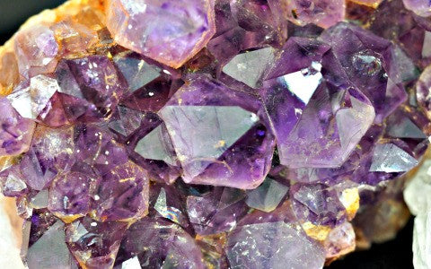 An image of a piece of amethyst crystal, the birthstone of February