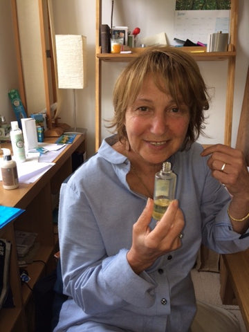 Sarah-Lou, as she smells lavender oil created by monks in France