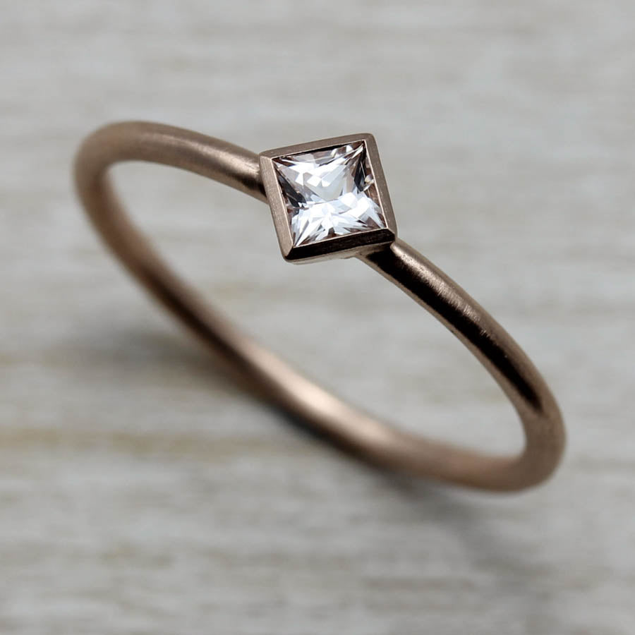Oblique Solitaire with Chatham White Sapphire bezel set in 14k Rose Gold