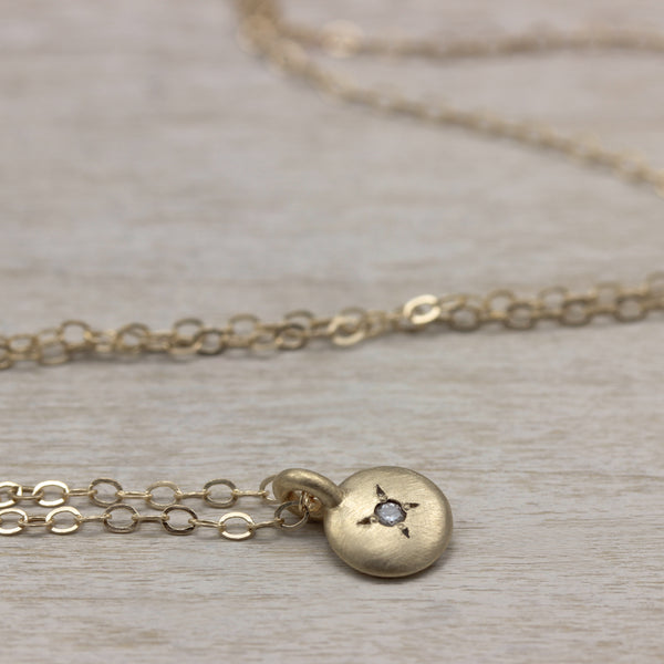 Aide-memoire Jewelry's Small Smooth Bead Set Pendant Necklace, in 14k yellow gold with a diamond, handmade in Seattle