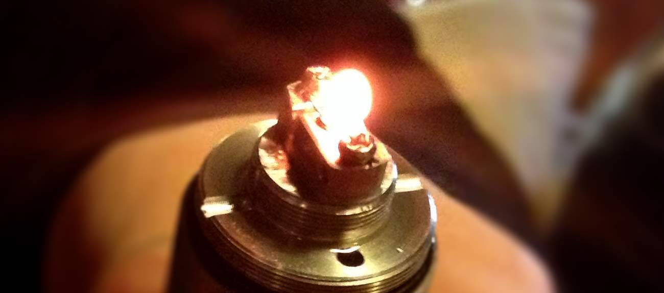 Glowing E-Cig Atomizer Coil being Dry Fired