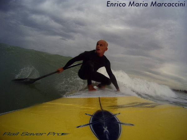 Enric Maria Marcaccini Rail Saver PRO ambassador on a wave
