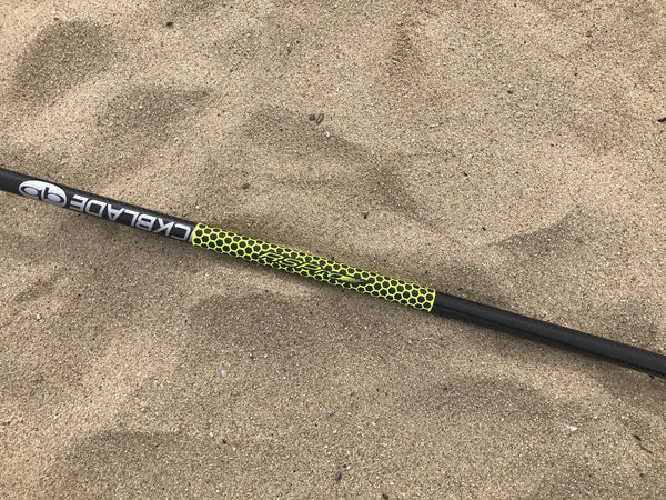 Paddle Grip RSPro Hexa Yellow Fluor on the sand