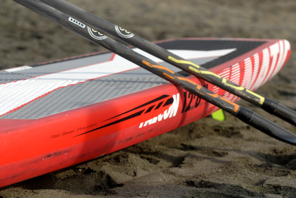 Red Stripes rail saver on a red Fanatic SUP board