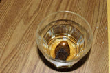A shot of alcohol with a human toe in it known as the sourtoe coctail club.