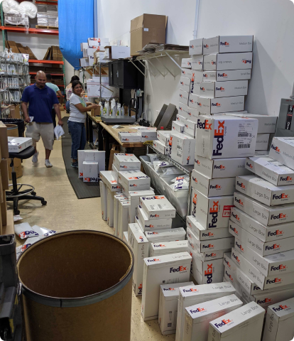 Pile of FedEx Express packages ready to ship to customers inside the ZNF Warehouse