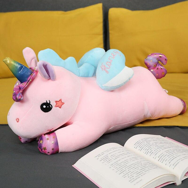 big fluffy unicorn stuffed animal