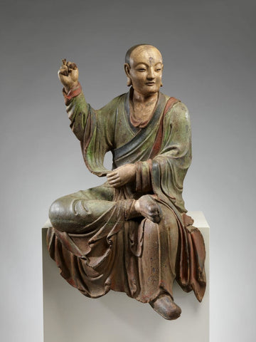 Un des arhats du Bouddha. XIXe siècle, Chine. Bois avec pigment.