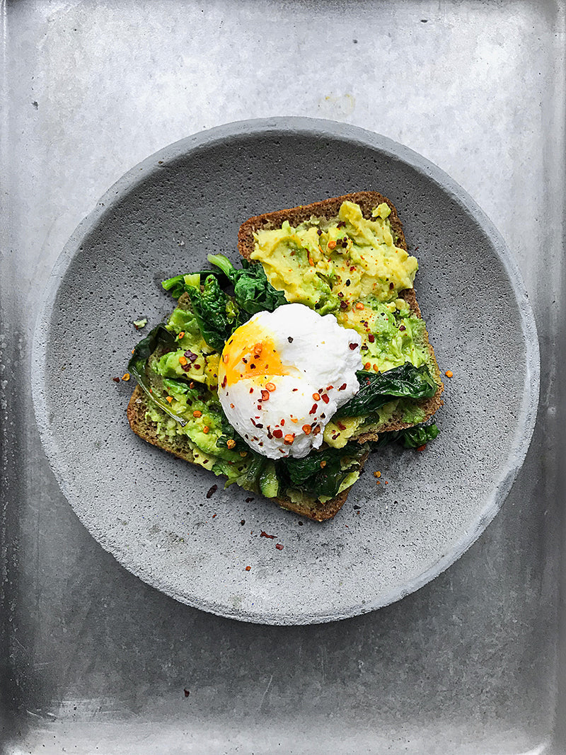 Avocado and eggs on toast for protein as part of a diet to help hair grow faster