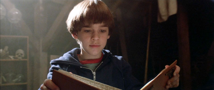 Bastian in the attic, reading the book