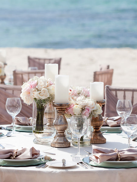 Blush table decor on the beach