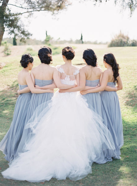 Bridesmaids in blue gowns
