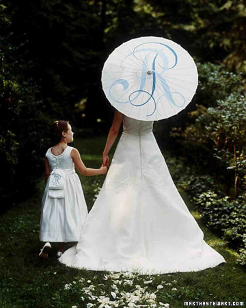 Bride with monogrammed umbrella