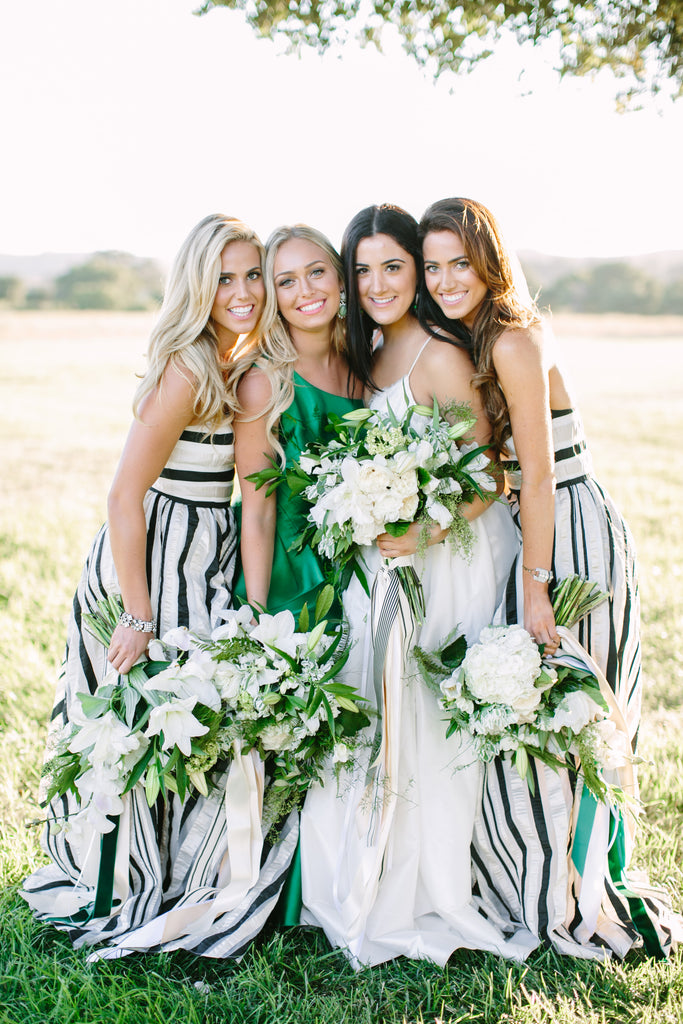 Bridesmaids in striped dresses