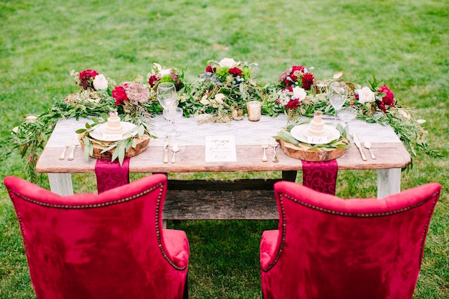 Red bride and groom chairs