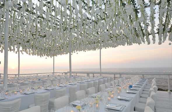 White wedding decor by the sea