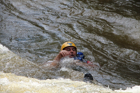 Whitewater Rafter Overboard