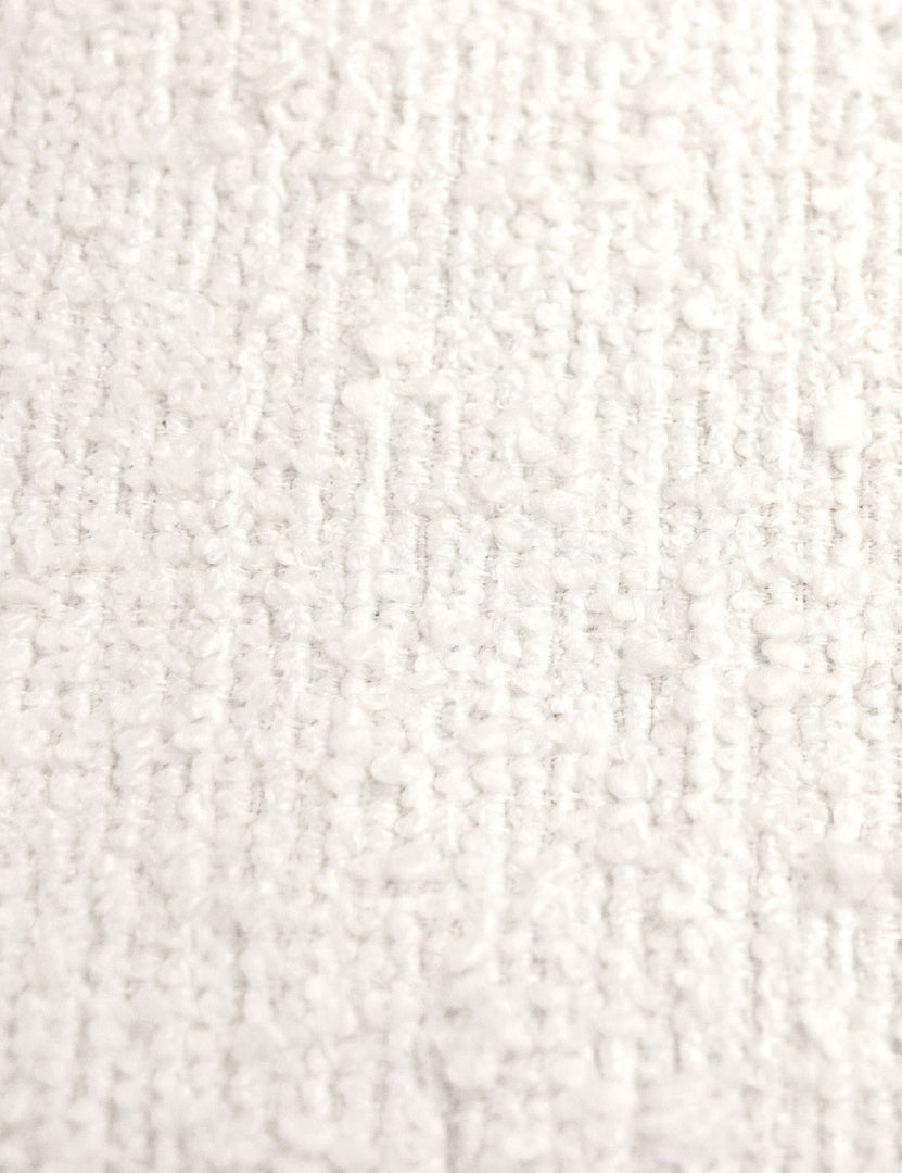 Detailed shot of the white boucle on the Adara white boucle upholstered bed.