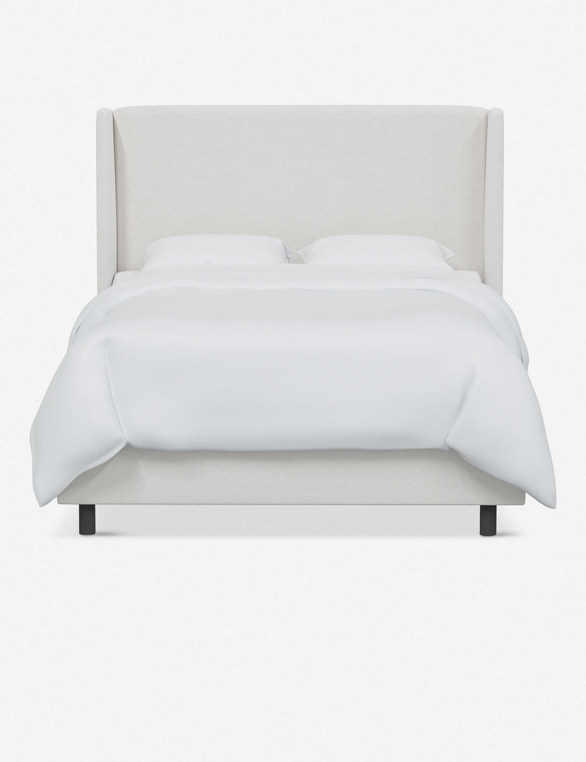 Adara white velvet upholstered bed.