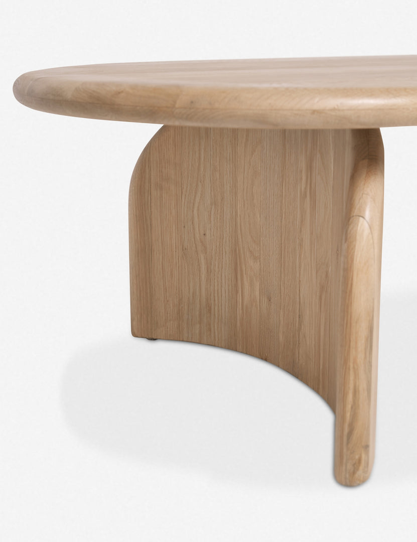 Close-up of the outside of the curved leg on the Ada solid oak oval coffee table