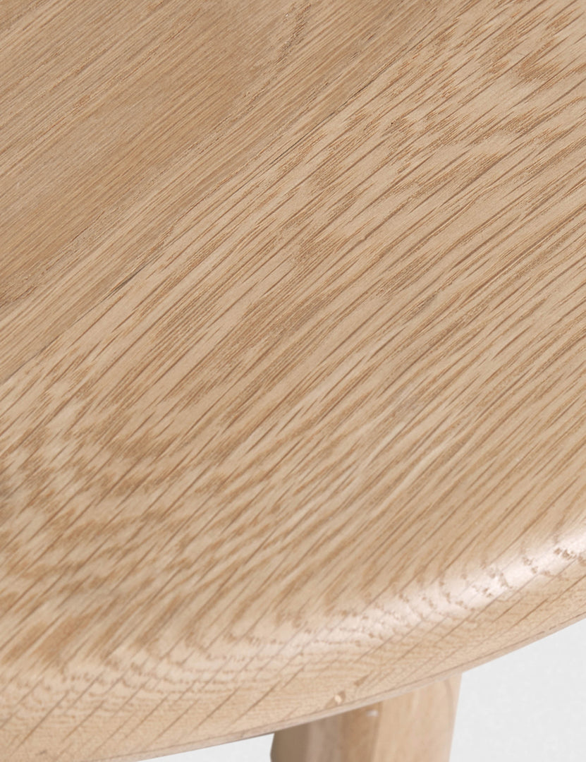 Close-up of the edge of the Ada solid oak oval coffee table